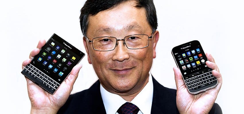 BlackBerry CEO Chen holds up the unreleased Blackberry Passport and Blackberry Classic devices during the company's annual general meeting for shareholders in Toronto